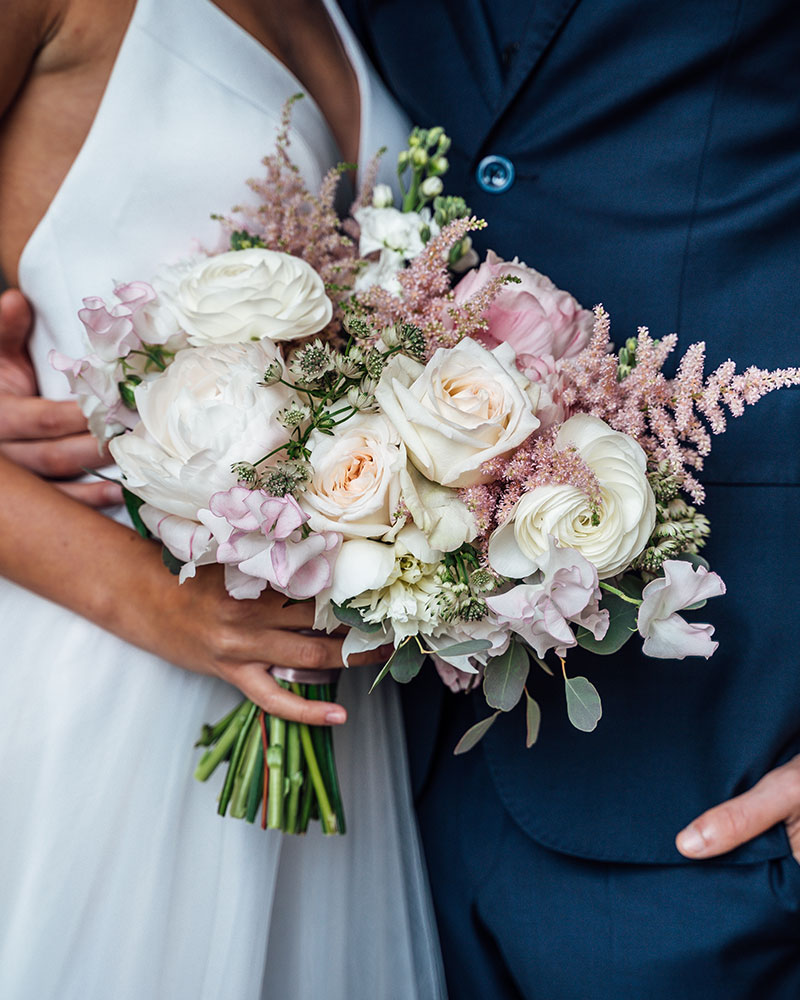wedding couple with beautiful flowers